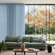 Sky Blue Linen S-Fold Extra Long Curtains in a Modern Living Room with Floor-to-Ceiling Windows and Garden View
