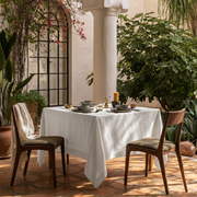 Off-White Square Heavy Weight Linen Tablecloth in a Mediterranean Outdoor Dining Area with Terracotta Tiles