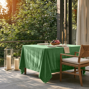 Fern Green Square Velvet Tablecloth in a Modern Outdoor Dining Area with Glass Railings