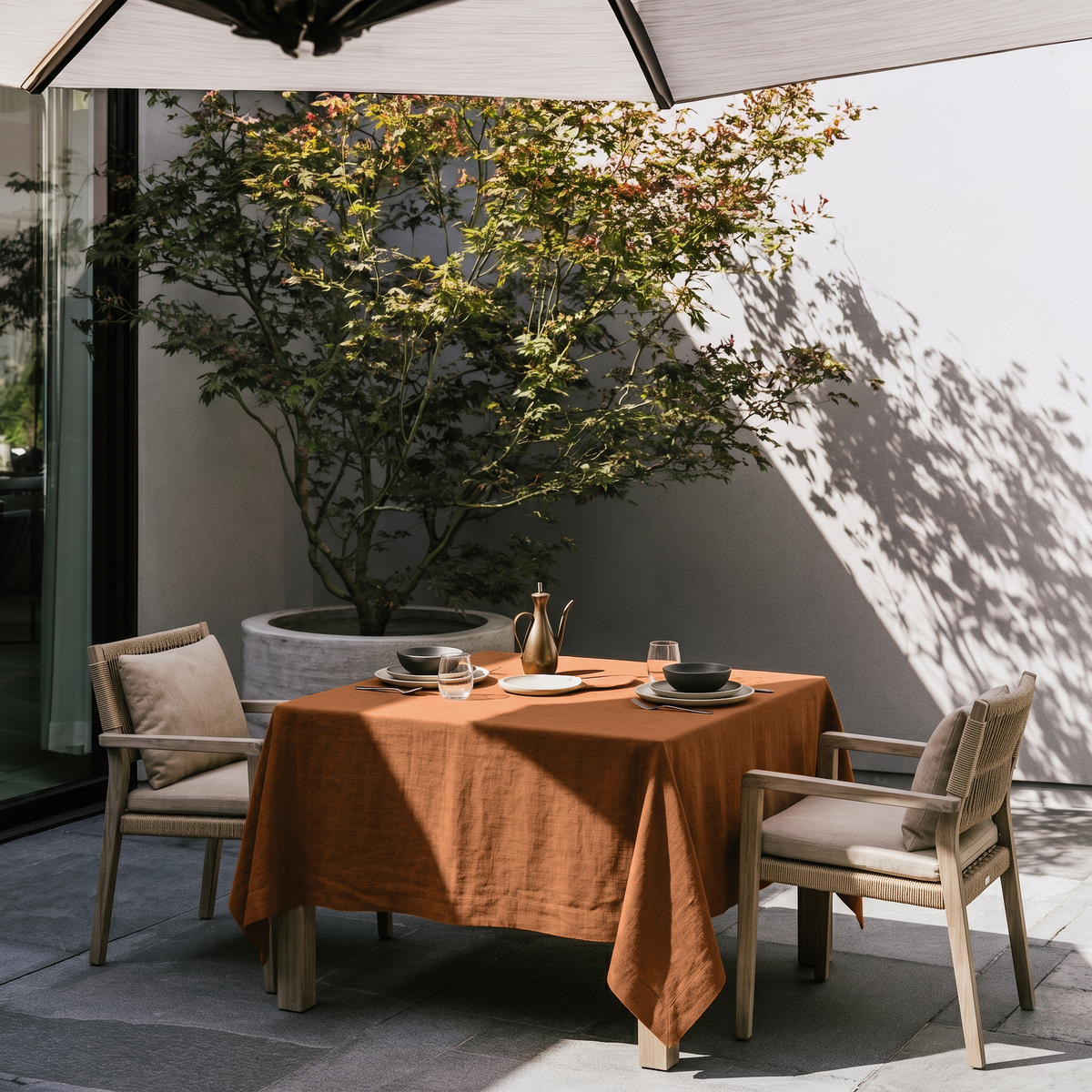 Terracotta Square Heavy Weight Linen Tablecloth in a Modern Outdoor Patio