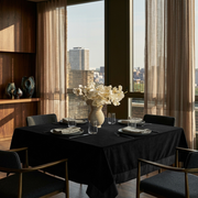 Black Square Velvet Tablecloth in a Modern Dining Room with City Views and Sheer Curtains