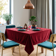 Dark Deep Red Square Velvet Tablecloth in a Contemporary Dining Room with Teal Chairs