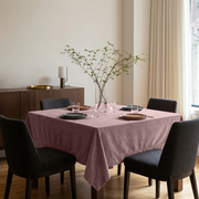 Pink Square Velvet Tablecloth in a Contemporary Dining Room with Dark Upholstered Chairs and a Walnut Sideboard