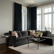Steel Black Velvet S-Fold Curtains in a Transitional Living Room with a Dark Sectional