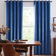 Steel Blue velvet Curtains in a Dining Room with Neutral Walls and a Large Brown Table, Brown Upholstered Chairs