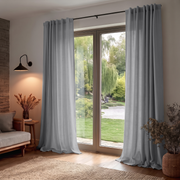 Stone Grey Back Tab Extra Long Curtains in a Contemporary Living Room with a Garden View and Warm Ambient Lighting