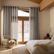 Stone Grey Linen Grommet Bedroom Curtains in a Warm Contemporary Bedroom with Cream Accents