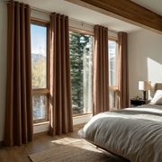 Tawny Brown Linen Grommet Curtains in a Cozy Mountain Bedroom with Exposed Wood Beams - Blackout Lining