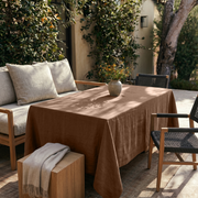 Tawny Brown Rectangular Linen Tablecloth in a Contemporary Outdoor Dining Area with Cushioned Seating