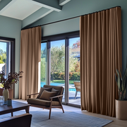 Tawny Brown Linen S-Fold Curtains for Sliding Doors in a Living Room with Blue Walls - Cotton Lining
@Heading: S-Fold