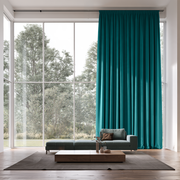 Teal Pencil Pleat Extra Long Curtains in a Minimalist Living Room with Green Low-Profile Sofa