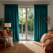 Teal Velvet Pinch Pleat Blackout Curtains for Sliding Doors in a Bedroom with Off-White Walls