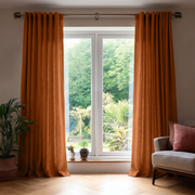 Terracotta Heavy Weight Linen Back Tab Extra Long Curtains in a Contemporary Living Room with Neutral Armchair
