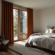Terracotta Heavy Weight Linen Grommet Curtains in a Serene Mountain Bedroom With Light Beige Walls and Natural Wood Tones - Blackout Lining