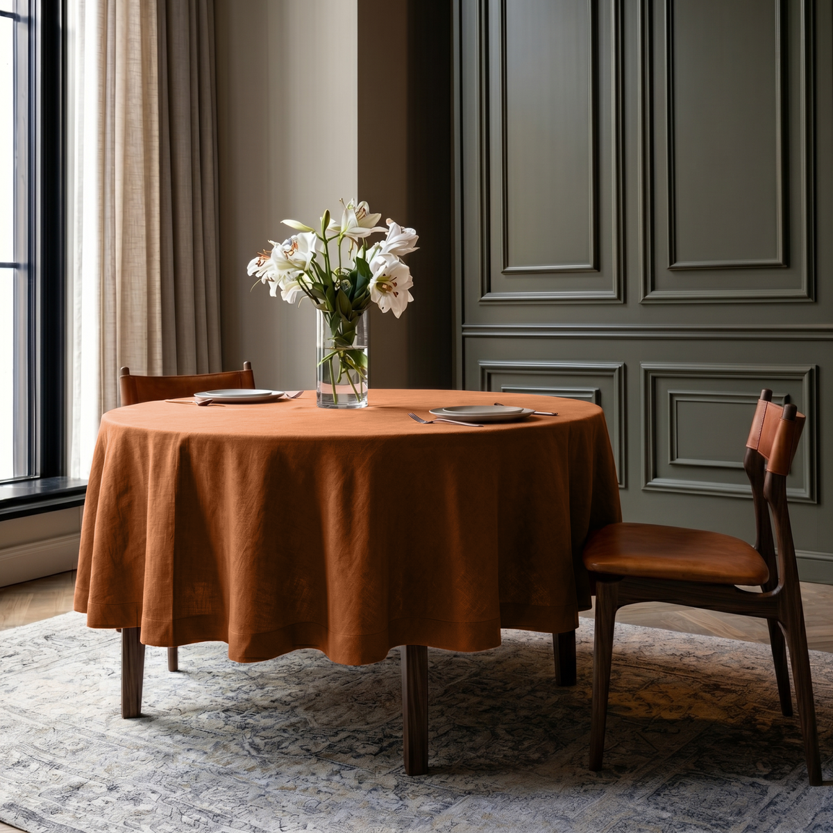 Terracotta Heavy Weight Linen Round Tablecloth in an Elegant Dining Room with Deep Taupe Paneled Walls