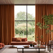 Terracotta Heavy Weight Linen S-Fold Extra Long Curtains in a Mid-Century Modern Living Room with Floor-to-Ceiling Windows and Garden Views