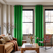 Lime Green Velvet Grommet Curtains in an Eclectic Living Room with Cream Walls and Caramel Seating