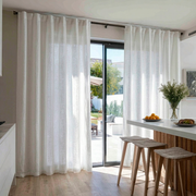 White Linen Back Tab Curtains for Sliding Doors in a Dining Room with Warm White Walls
@Heading: Back Tabs