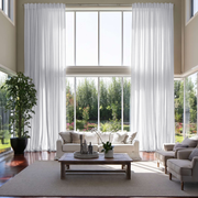 White Linen Back Tab Extra Long Curtains in a Modern Living Room with Double-Height Windows