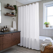 White Linen Button-Hole Top Shower Curtain in a Modern Bathroom with Gray Tile Walls and Walnut Vanity