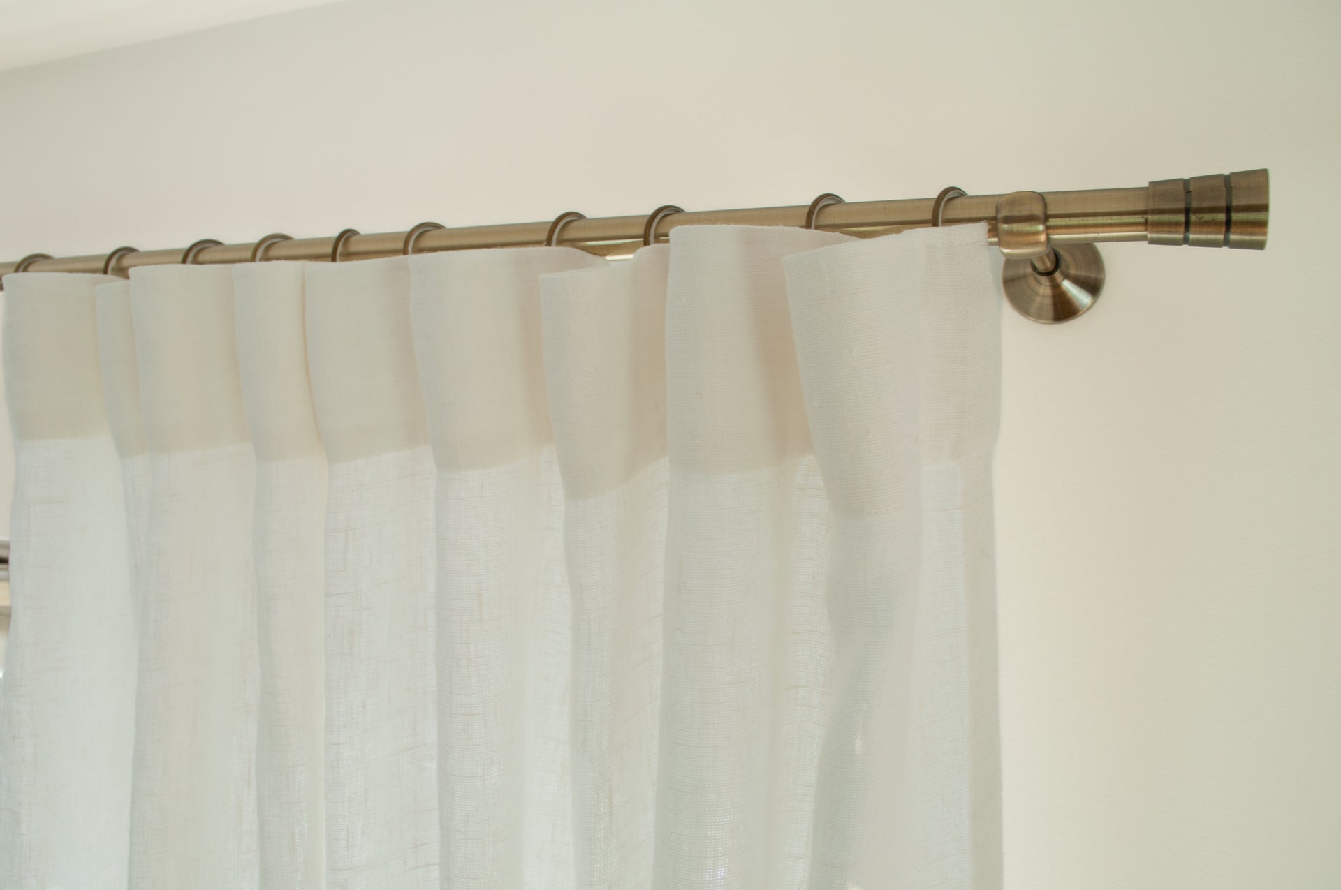 Multiway curtain hung on hooks and rings